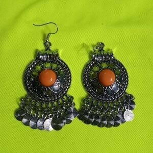 Silvertone orange dangle wire earrings